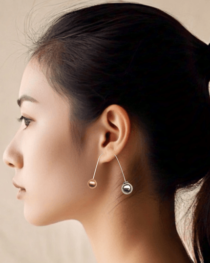 Balancing yin and yang earrings - Sundara Joon