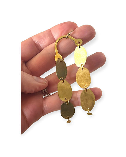 Everything in balance earrings deliver a statement - Sundara Joon