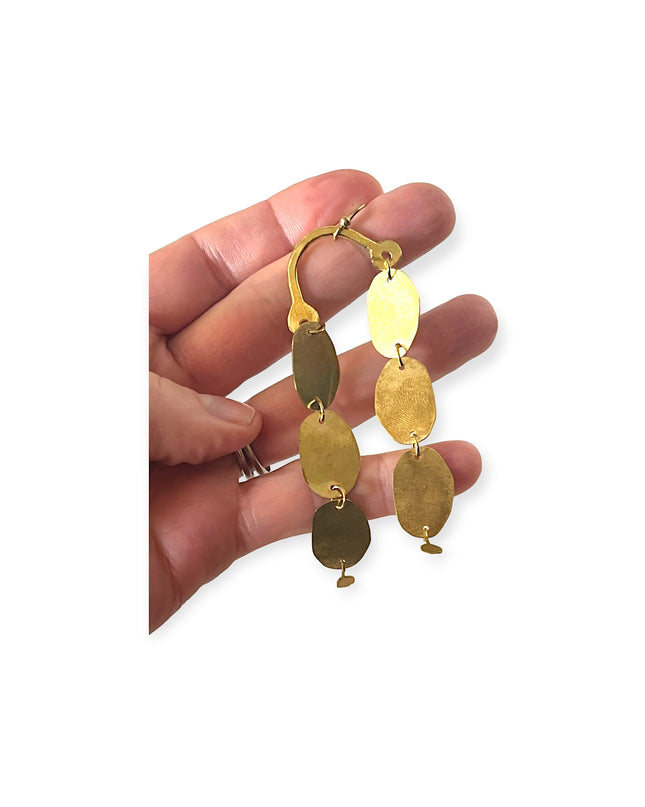 Everything in balance earrings deliver a statement - Sundara Joon