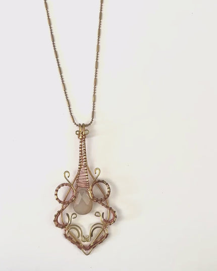 organic tear drop pendant with pale pink gemstone in middle - Sundara Joon