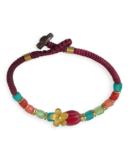 Richly colored beaded bracelet with flower charm - Sundara Joon