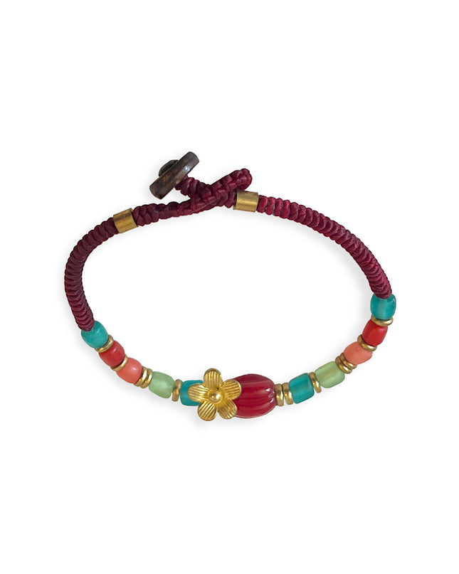 Richly colored beaded bracelet with flower charm - Sundara Joon