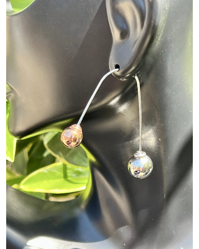 Balancing yin and yang earrings that make a statement - Sundara Joon