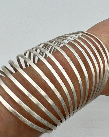 Statement cuff bracelet in metal that for a bold look at Sundara Joon